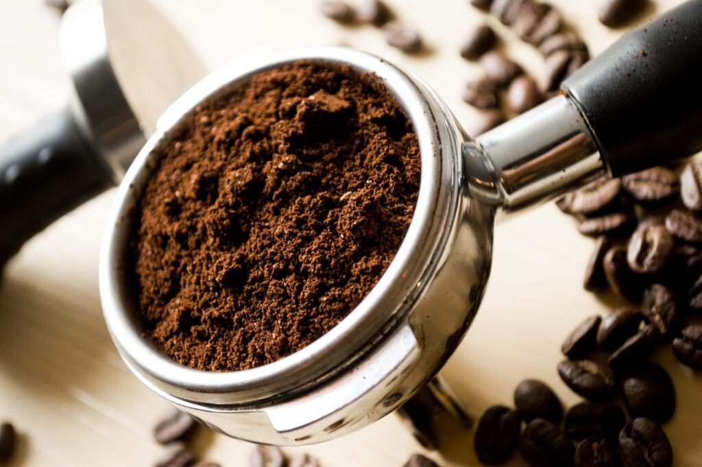 Ground coffee in an espresso filter basket